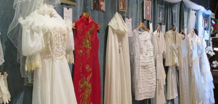 Old Mill Heritage Museum displays historical wedding gowns and cakes