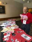 2020-special-olympics-winter-9-Bruce-Van-Horn-with-support-cards-from-TBay-school