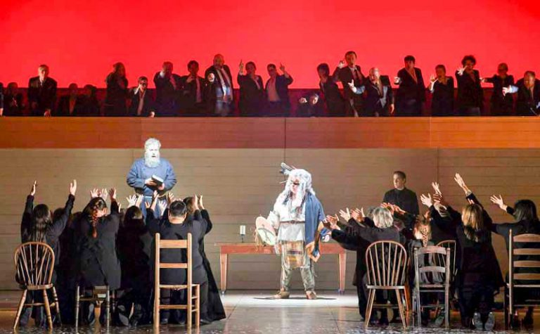 Wiikwemkoong opera singer onstage with Louis Riel