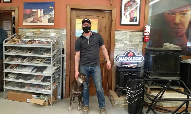 Jarvis Brookes and his two pups boost the mood at Noble Lumber