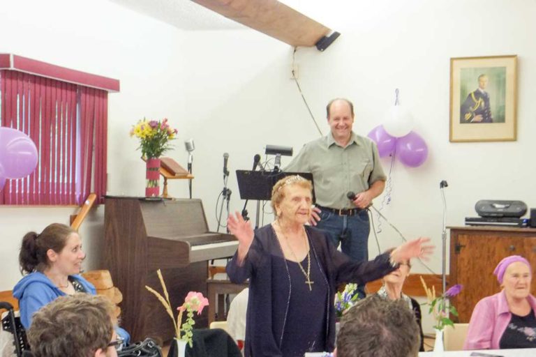 Jean McCauley celebrates 100th birthday surrounded by family, friends and song