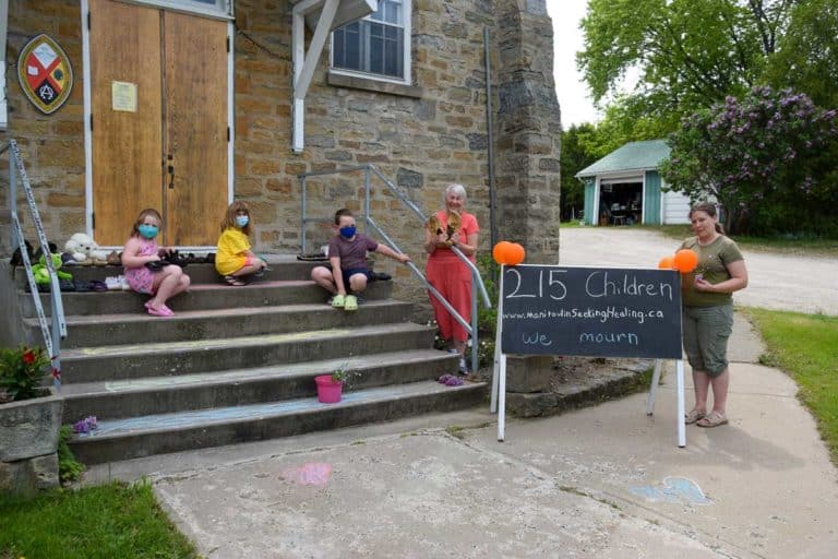 Manitoulin KAIROS group organizes portable display of 215 pairs of kids’ shoes in mourning for unmarked graves at BC residential school