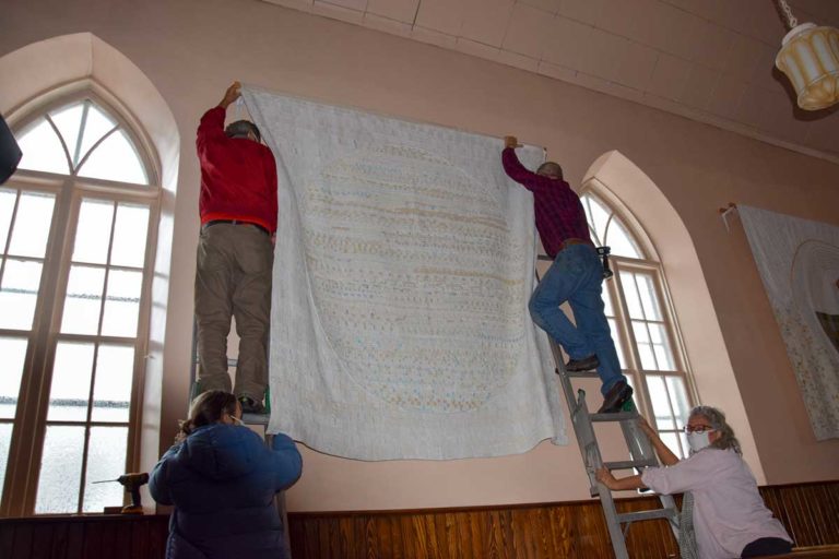 Judy Martin’s community sewing fabric art project back home after four-continent tour