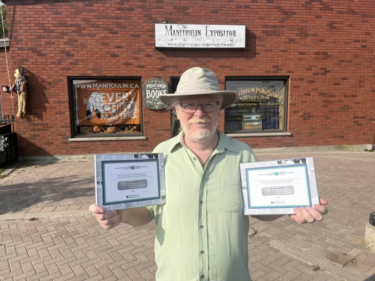 Expositor reporter nabs national awards