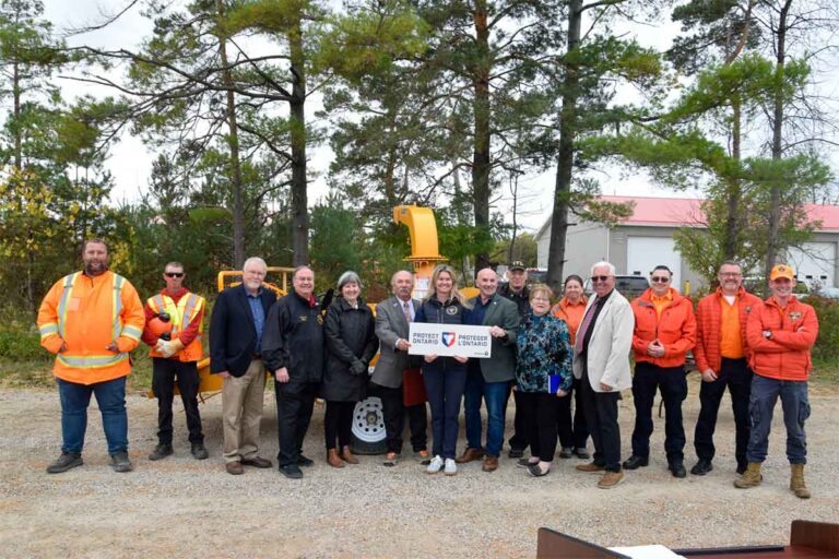 Ontario cabinet minister put to work on Town of Northeastern Manitoulin and Islands woodchipper