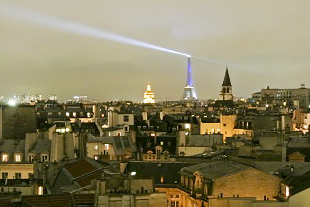 Island woman in Paris attends memorial
