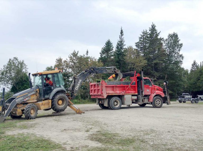 Truxor cutting machine harvests 11 truckloads of phragmites from Michael’s Bay