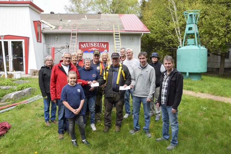 Volunteers and sponsors replace Little Schoolhouse Museum roof
