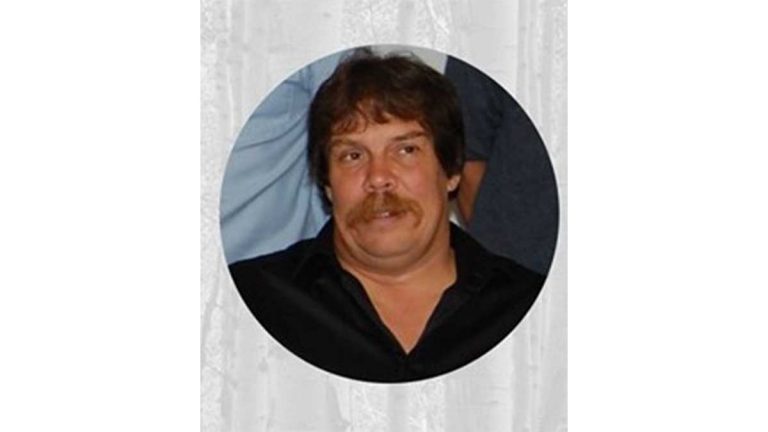 M’Chigeeng residents line the streets of their community to say baamaapii to deputy chief