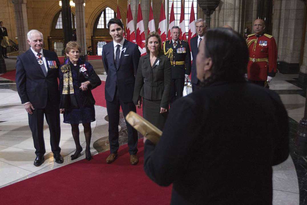 Wikwemikong band member drums  honour song to open 42nd Parliament