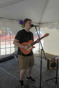 Singer Ethan Hunt of Kagawong entertains the audience at the Harbour Days celebration.