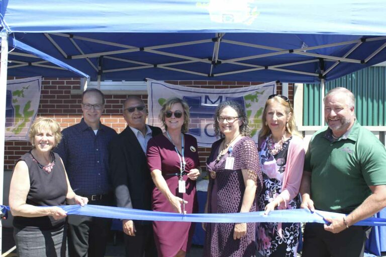 Cutting the ribbon! From left, Carol Hughes, MPP for Algoma-Manitoulin-Kapuskasing, Jeff Smith of the Douglas A. Smith Family Foundation, Dennis McGregor, board chair of the Manitoulin Health Centre, Paula Fields, president and CEO of MHC, Dr. Maurianne Reade, president of professional staff of MHC, France Gelinas MPP for Nickel Belt, and Michael Mantha, MPP for Algoma-Manitoulin take part in the ribbon cutting ceremonies for the newly renovated and expanded emergency department at the Mindemoya Hospital site.