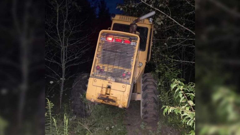 M’Chigeeng man arrested and charged after stolen front-end loader causes extensive damage in the community