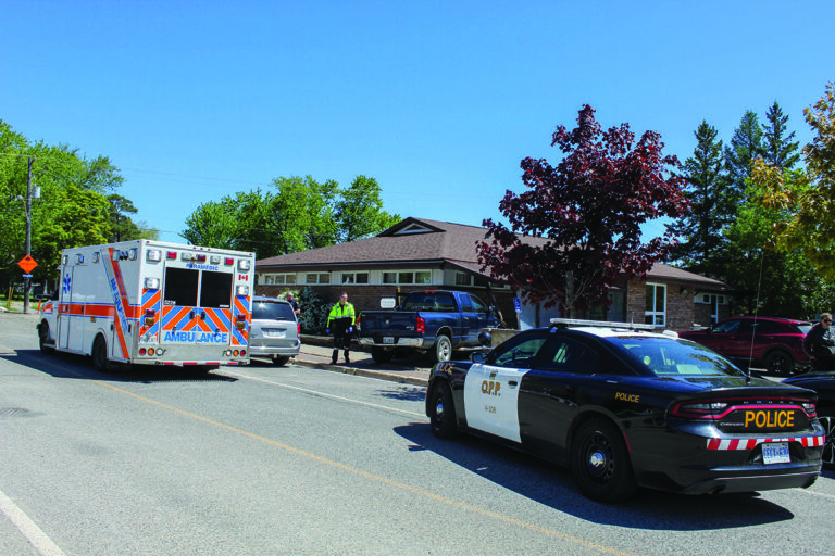 Vehicle strikes car, Gore Bay Medical Centre, no one injured