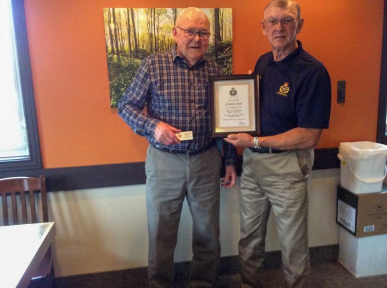 Graham Lloyd receives a lifetime membership to the Ontario Provincial Police Veterans Association