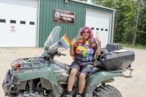 Gloria Debassige and her ATV are all decked out for the Sheshegwaning Pride parade.