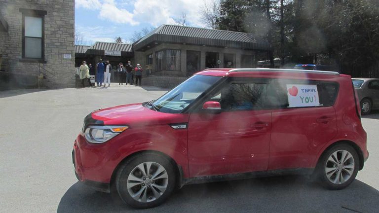 Community members come out in droves to support front-line health care workers at parades