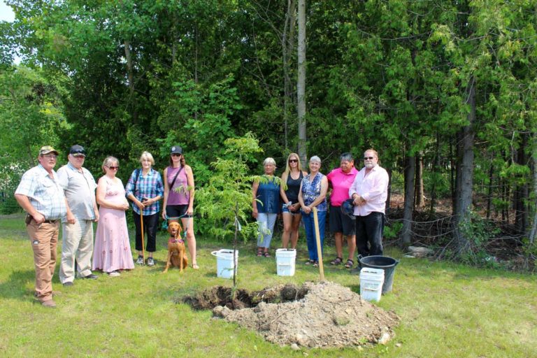 Memorial tree planted at Mindemoya fire station in memory of John Reid