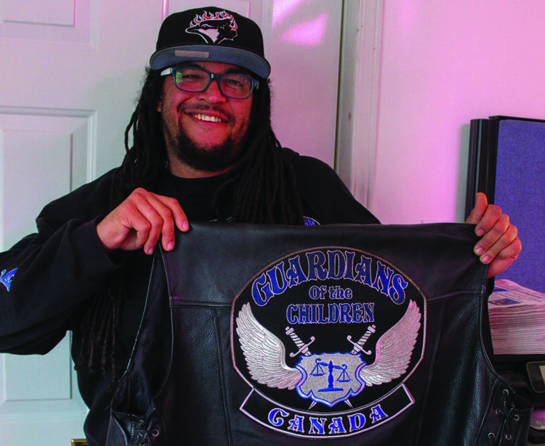 Justin Harris is a “Guardian of the Children’ and volunteer firefighter